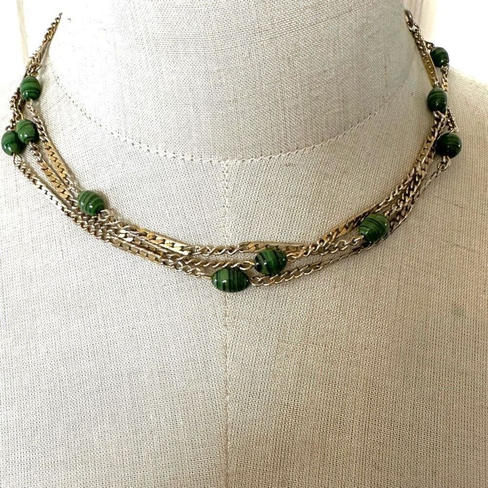 Gold tone green beaded long necklace